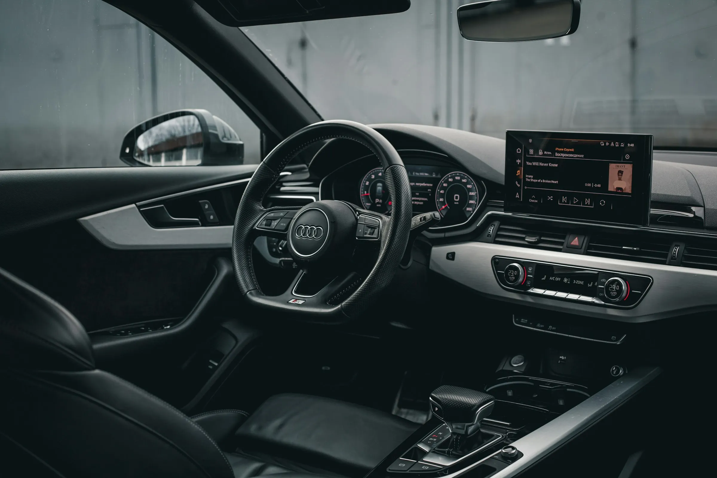 Audi interior with clean leather seats and dashboard