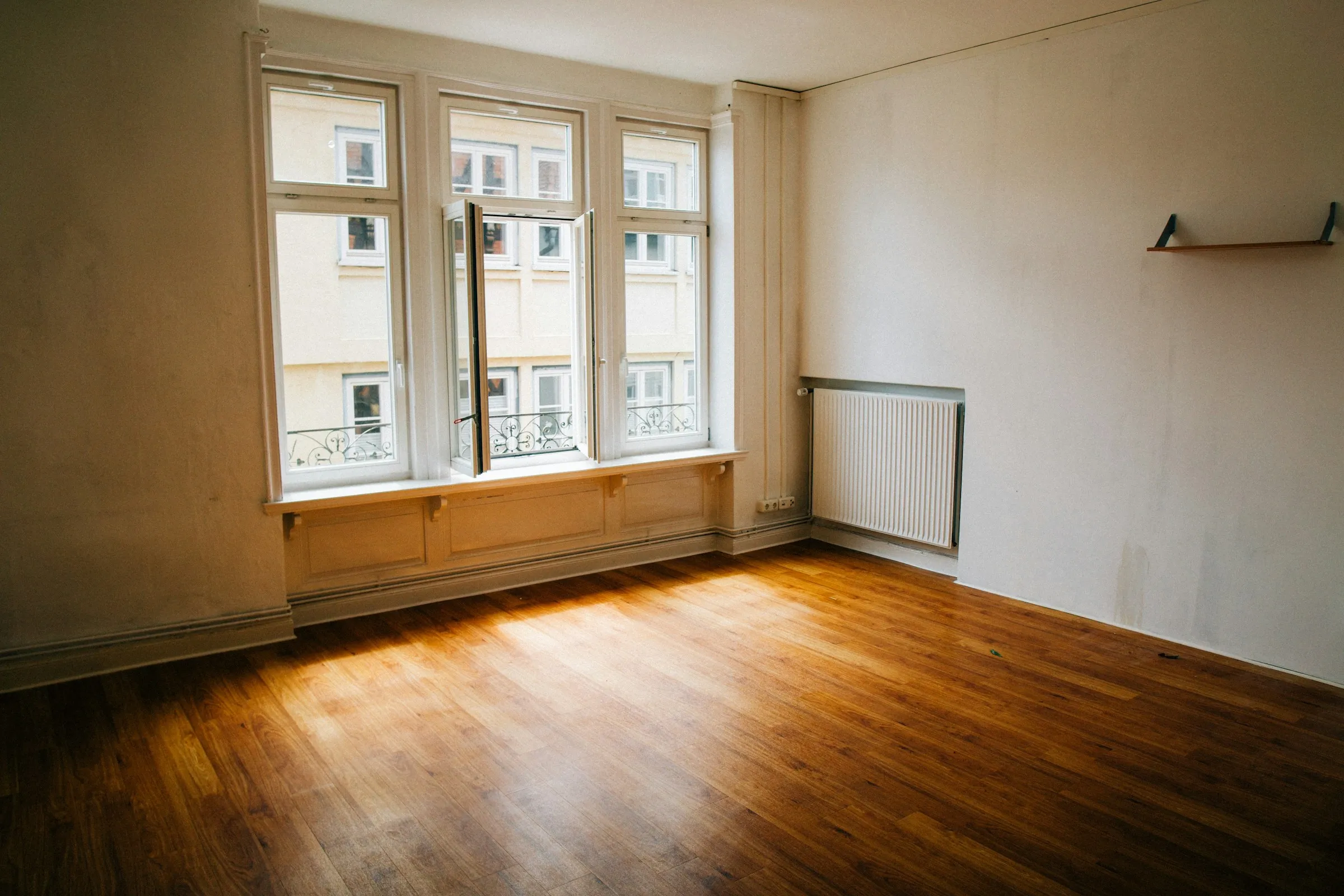Empty, freshly cleaned room with window light
